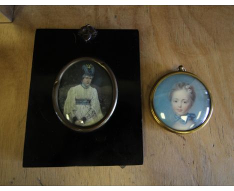 Two miniature portrait prints, one in ebonised frame