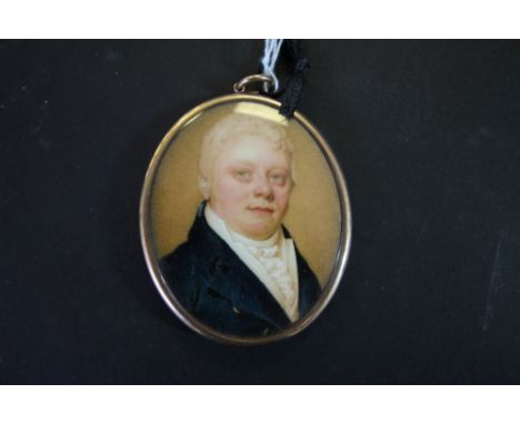 Late 18th century miniature Mourning portrait of fair haired gentleman with blue jacket, plaited hair back, inset with gilt m