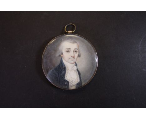 Late 18th/ early 19th Century Miniature Mourning portrait of a man wearing blue coat, plaited hair back with inset motto 'Uni