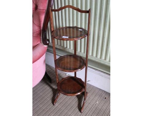 A Walnut Three tier folding cake stand
