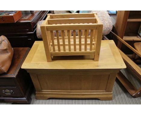A modern light oak storage box chest together with a similar magazine rack