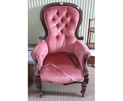 A Victorian show wood frame button back arm chair 