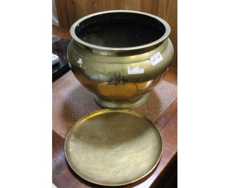 An oriental brass planter with small hammered plate