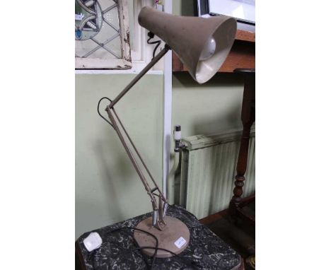 A buff coloured three spring anglepoise lamp