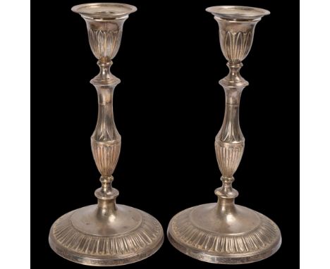 A pair of George VI silver table candlesticks, Harrison Brothers & Howson, Sheffield 1938, with removeable sconces, 26cm, 46.