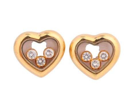CHOPARD - a pair of 18ct gold diamond 'Happy Diamonds Icons' heart stud earrings, ref. 83/4611-20, the heart with glass panel