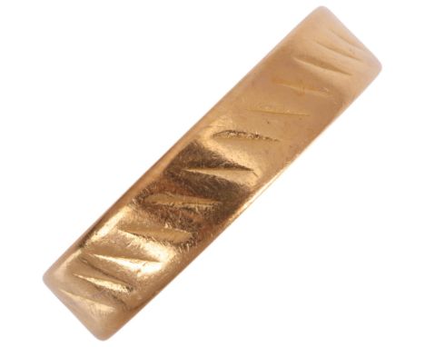 A 22ct gold wedding band ring, maker SH, Birmingham 1961, band width 4.4mm, size O, 2.4g .  Condition Report: Ring quite worn