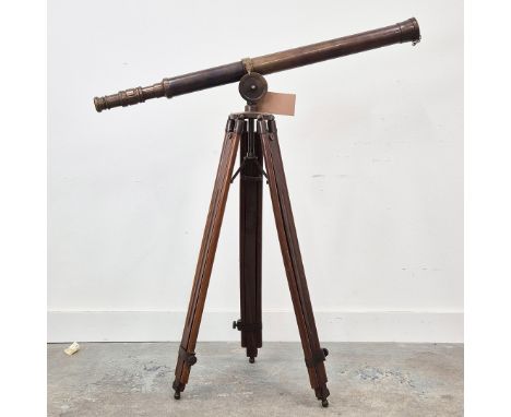 TELESCOPE. Vintage style brass on adjustable 110cm High approximately.