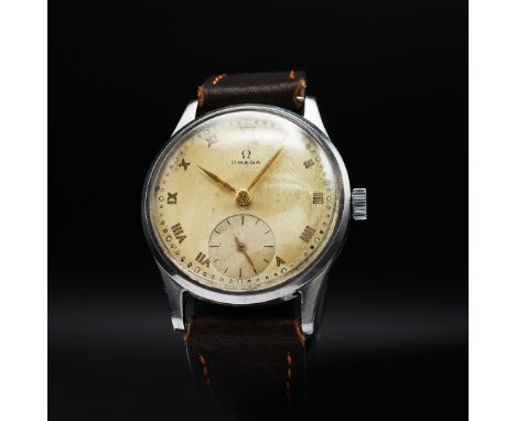 OMEGA. OMEGA SUB SECOND WRIST WATCH. 34mm, 1947, champagne dial with roman numeral markers, 30T2 manual wind movement, origin