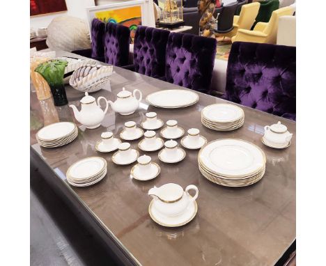 A ROYAL DOULTON 'CLARENDON' DINNER AND TEA SERVICE. comprising eight dinner plates, eight starter plates, eight dessert plate