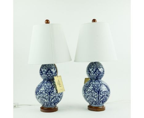 LAUREN RALPH LAUREN HOME TABLE LAMPS, A PAIR, DOUBLE GOURD DESIGN, BLUE AND WHITE GLAZED CERAMIC. with shades, 53.5cm H appro