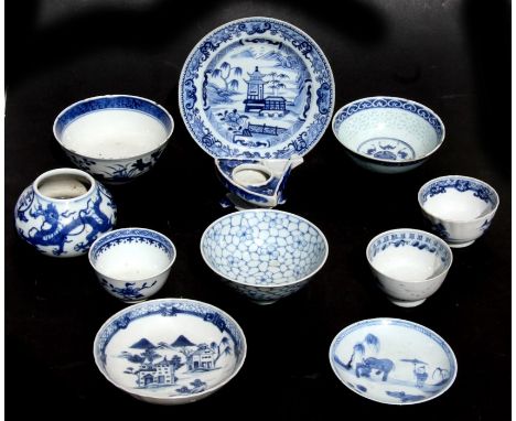 A group of Chinese and Japanese blue & white ceramics to include a brush washer, tea bowls and saucers.Condition ReportMinor 