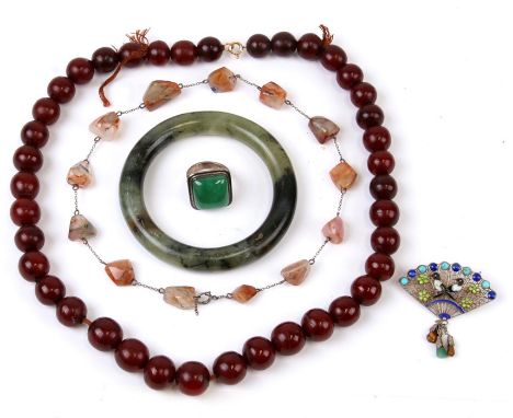A hardstone bangle; together with a bead necklace, possibly amber; and other items.Condition ReportBead necklace weight 64.5g
