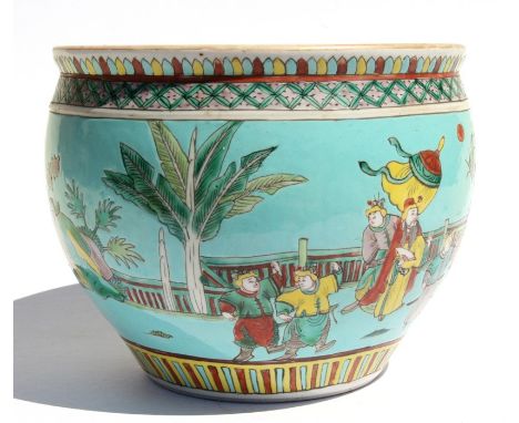 A Chinese planter or fish bowl decorated with figures in a landscape on a turquoise ground, with internal goldfish and water 