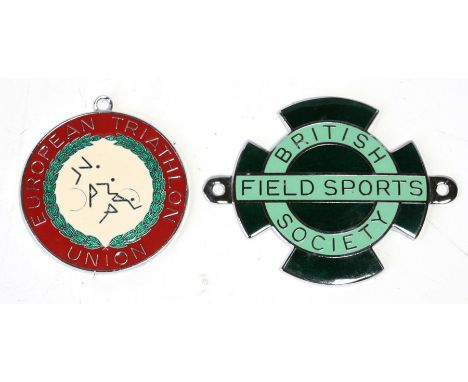 A British Field Sports Society chrome and enamel car badge by Butler 9.5cms (3.75ins) by 7.5cms (3ins) together with a chrome