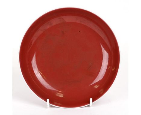 A Chinese red monochrome glaze shallow dish with blue seal mark to the underside, 19cms (7.5ins) diameter.Condition ReportVer
