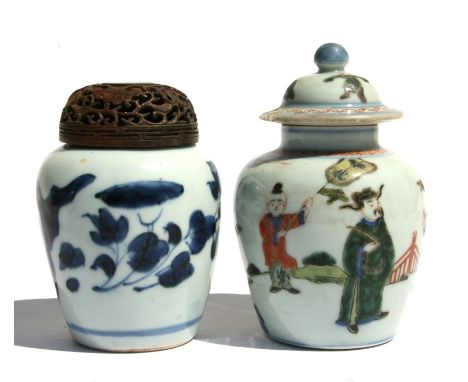 A Chinese famille rose Kangxi jar and cover decorated with figures, 13cms (5ins) high (chipped to the cover); together with a