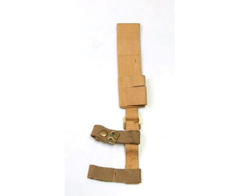 An unissued 08 Pattern bayonet frog with helve strap and carrier. Marked to the reverse of the frog with the War Department a