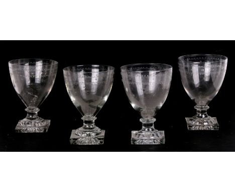 A set of four 19th century etched glass rummers with lemon squeezer base, 13cms (5ins) high) (4).Condition ReportThere is a l