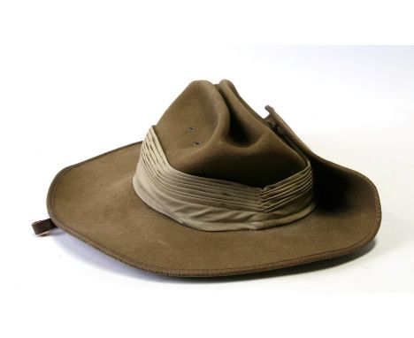 A John Bardsley military marked Slouch / Bush Hat. Having a 7 fold pagri with the upturned brim secured with a brass hook. Ma