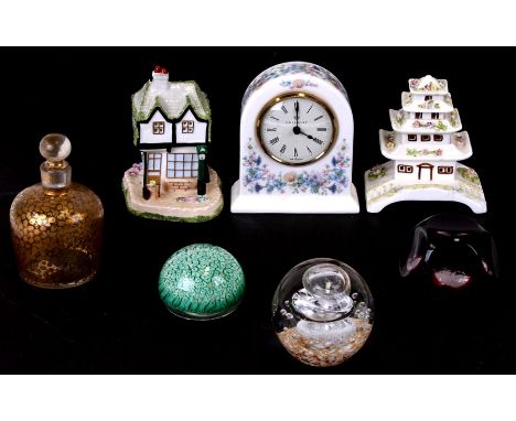 A Coalport mantle clock; together with a Coalport pastel burner; glass paperweights and other items.