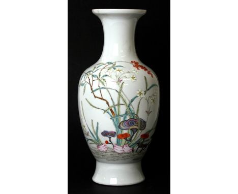 A Chinese famille rose Republic style vase decorated with flowering foliage, red seal mark to underside, 35cms (13.75ins) hig