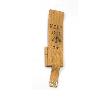 An unissued 08 Pattern bayonet frog with helve strap. Marked to the reverse with the War Department arrow and M.E.Co. 1917