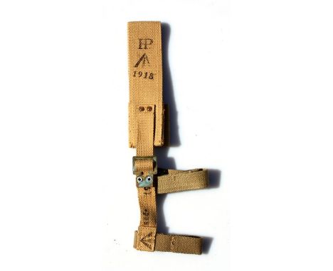 An unissued 08 Pattern bayonet frog with helve strap and carrier. Marked to the reverse of the frog with the War Department a