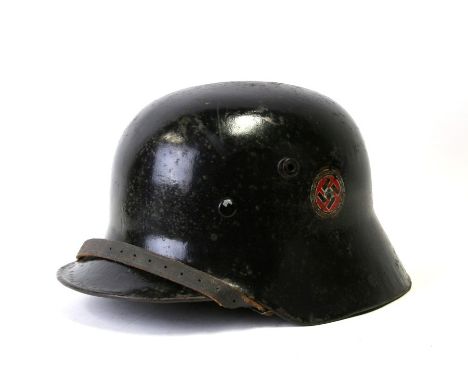 A German M16 Third Reich Wehrmacht helmet with liner and chin strap