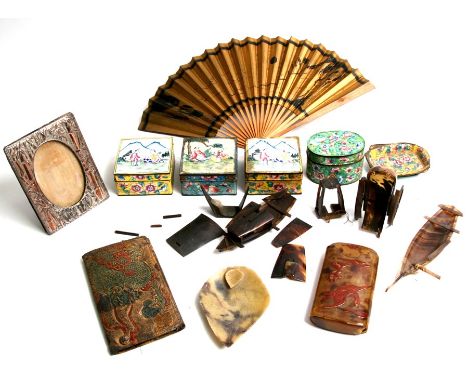 A group of Chinese enamel boxes, a Japanese antimony photo frame and other items.