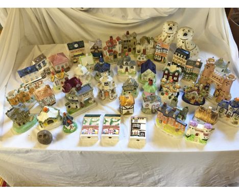 A large selection of ceramic houses.