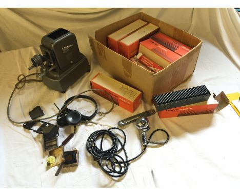 A slide projector, Piezoelettrico No 400 microphone and slide holders.