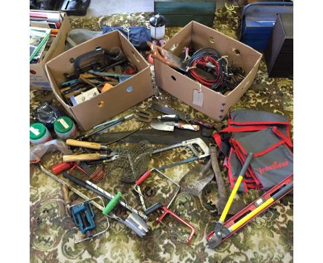 Two banana boxes with various tools including garden and workshop tools.