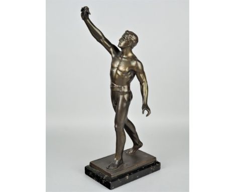Statuette eines Siegers in BronzeVollplastischer Bronzeguss eines Siegers in typischer Pose mit Lorbeerzweig in ausgestreckte