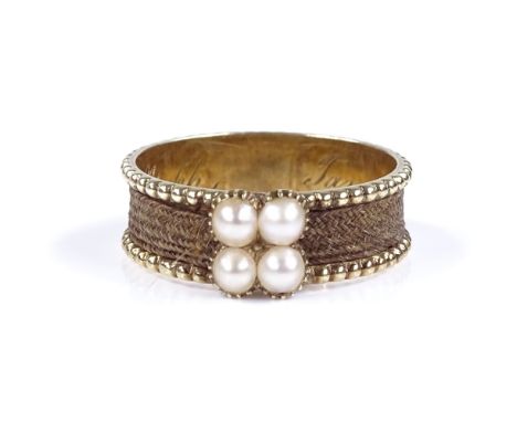 An Antique unmarked gold pearl and hair mourning ring, set with 4 split pearls and woven hair shank, inside shank inscribed "