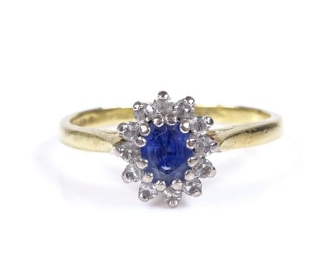 An 18ct gold sapphire and diamond cluster ring, setting height 8.9mm, size K, 2.8g 