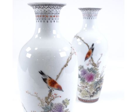 A pair of Chinese white glaze porcelain vases, with hand painted birds, flowers and text, height 22cm 