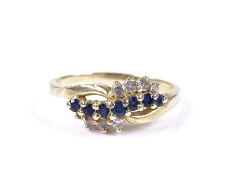 A 14ct gold sapphire and diamond crossover dress ring, setting height 8.2mm, size R, 3.4g 