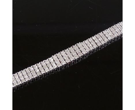 A sterling silver diamond triple row bracelet, length 19cm, 29.2g 