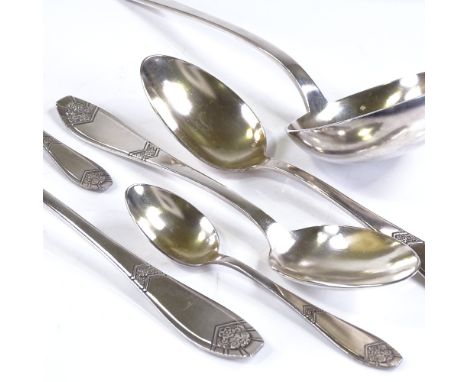 A Russian silver cutlery set, comprising ladle, serving spoon, 12 tablespoons, 12 table forks, and 12 teaspoons, all matching