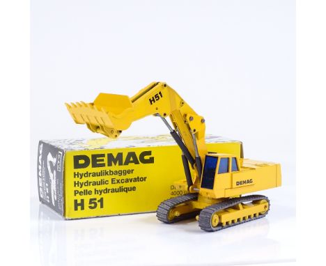 A boxed West German 1;50 scale diecast model Demag H51 hydraulic excavator by NZG 