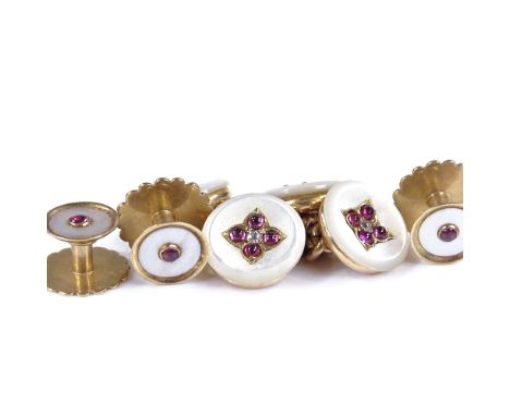 An unmarked gold ruby, diamond and mother-of-pearl gentleman's dress set, comprising pair of cufflinks (1 ruby missing), and 