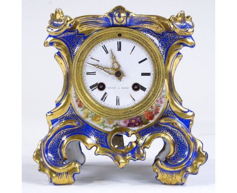 A 19th century French gilded porcelain-cased mantel clock, enamel dial signed Laine of Paris, with 8-day striking movement, h