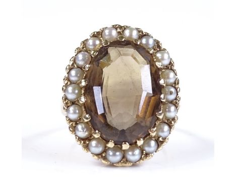 A large 9ct gold smoky quartz and seed pearl oval cluster ring, setting height 24.5mm, size Q, 9.5g 