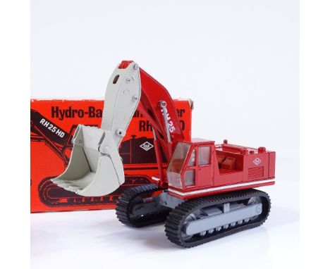 A boxed West German diecast model RH25HD hydraulic excavator and loader by O&amp;K (Orenstein &amp; Koppel) 