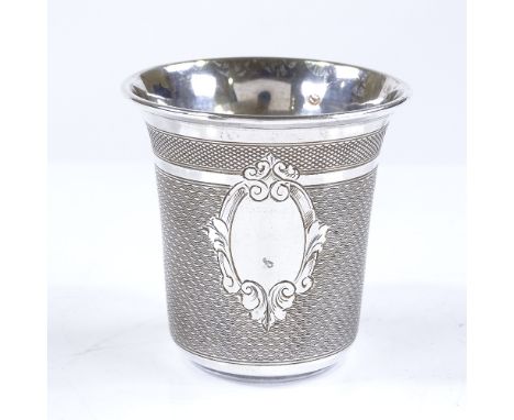 A small French silver thimble-shaped drinking tot, with engine turned decoration and gilt interior, by Claude Doutre Roussel 