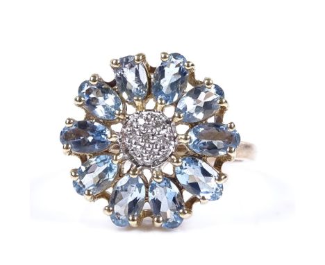 An unmarked gold blue stone and diamond daisy ring, setting diameter 16.7mm, size M, 3.6g 