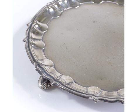 A small circular silver card tray, by J Parkes &amp; Co, hallmarks London 1927, diameter 16cm, 6.5oz 