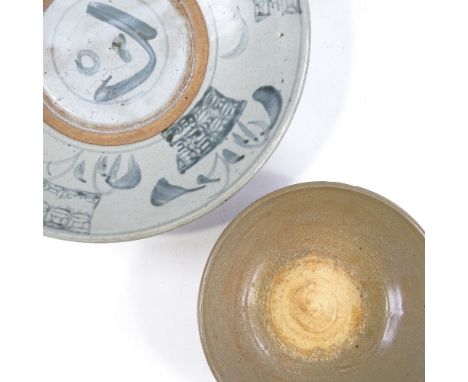 A Chinese brown glaze porcelain bowl with incised surround, diameter 15.5cm, and a Chinese blue and white bowl with painted b