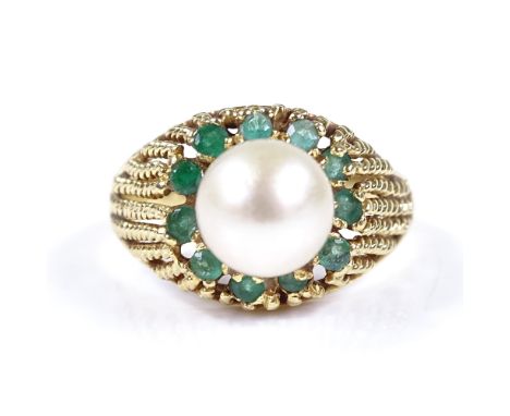 A Middle Eastern 18ct gold whole pearl and emerald cluster ring, with openwork rope twist bridge, setting height 12.8mm, size